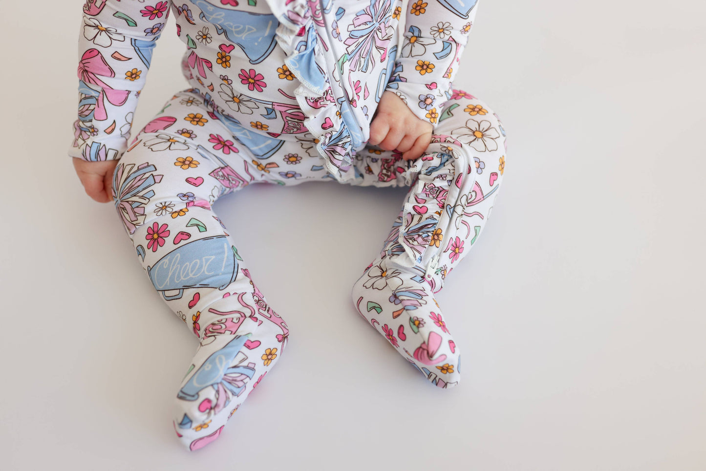 POM POWER DREAM RUFFLE ROMPER