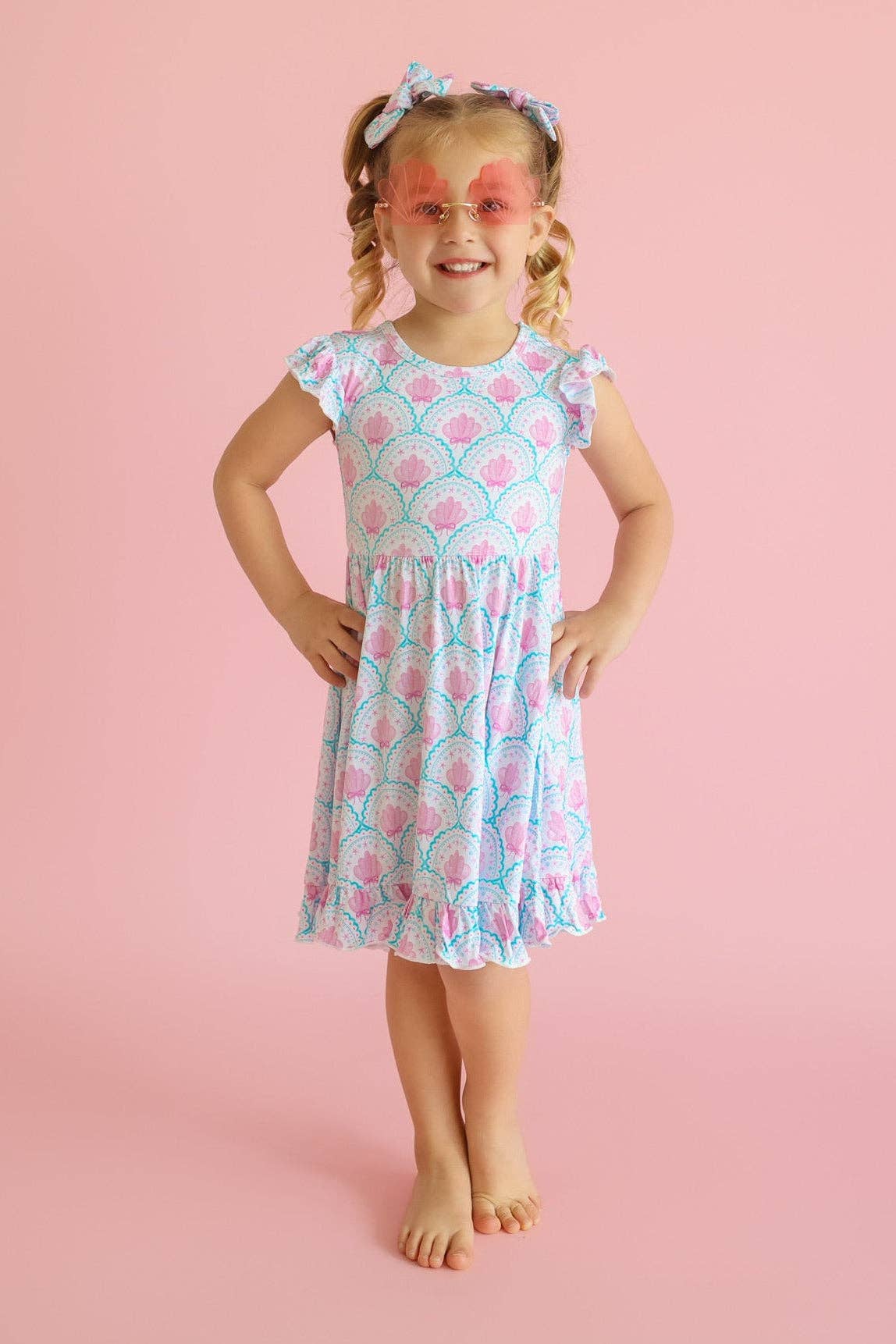 COQUETTE COAST CAP SLEEVE DREAM RUFFLE DRESS