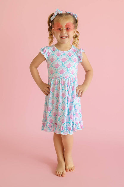 COQUETTE COAST CAP SLEEVE DREAM RUFFLE DRESS