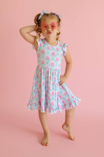 COQUETTE COAST CAP SLEEVE DREAM RUFFLE DRESS